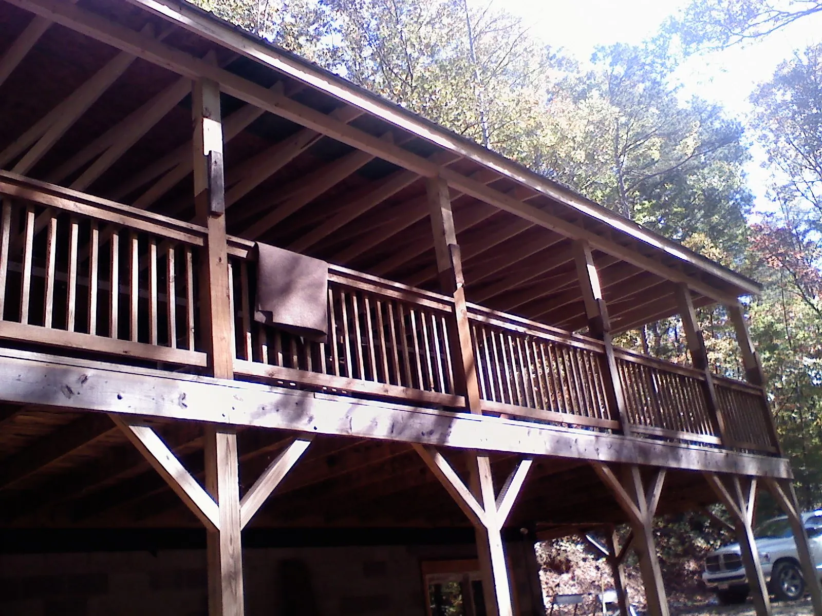 Timber framing under a new elevated porch and deck — Roof Leak Repair in Marshalltown by Roofing Brothers
